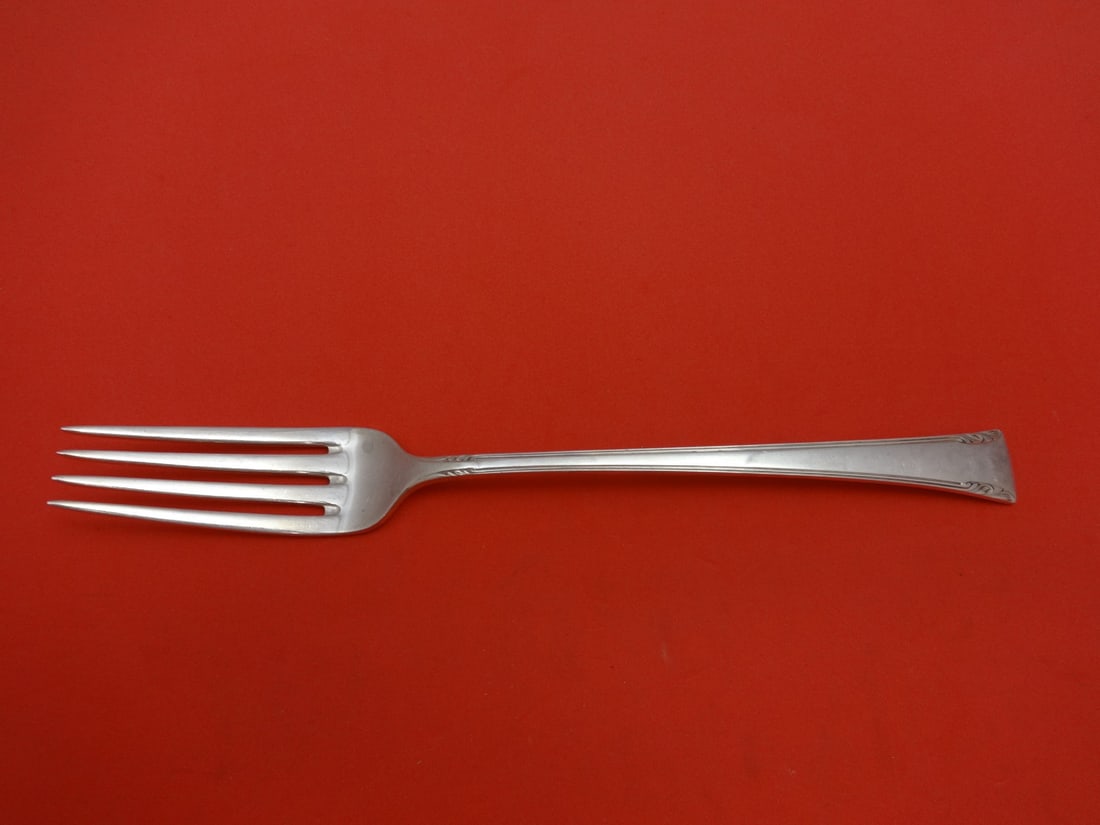 International Serenity Sterling Silver Dinner Fork 7 5/8: International Serenity Sterling Silver Dinner Fork 7 5/8 Sterling silver dinner fork in the Serenity pattern by International. It is a pre-owned piece, not monogrammed, and is in excellent condition. 