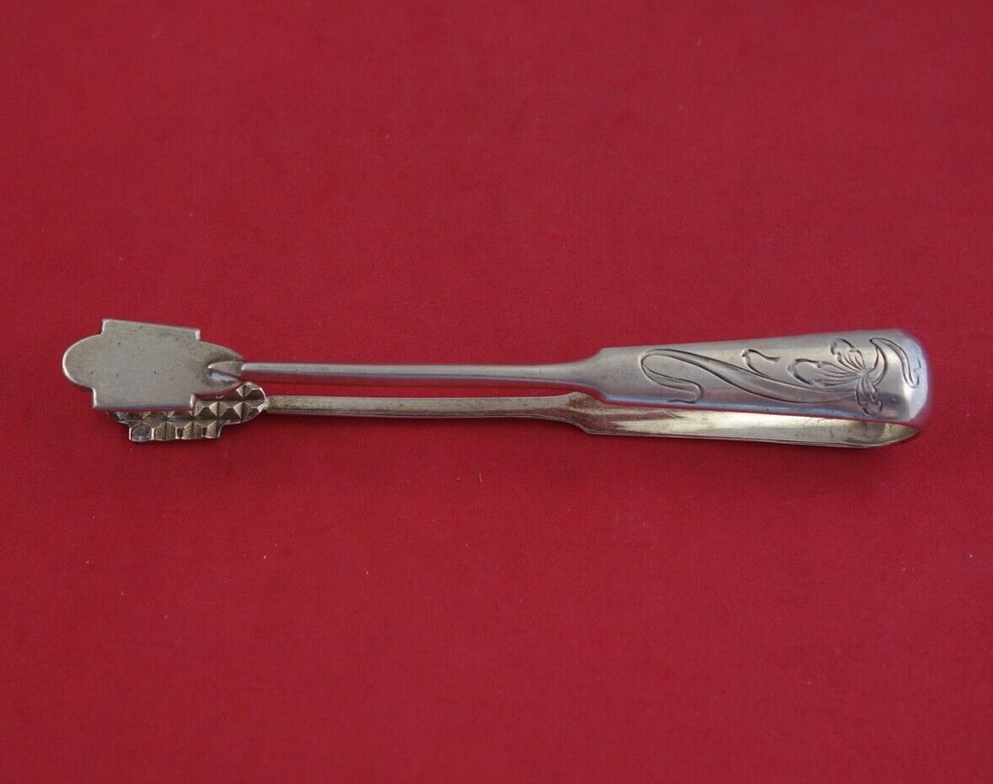 Kokoshnik Art Nouveau Russian Sterling Silver Sugar Tongs 1896-1908: Kokoshnik Art Nouveau Russian Sterling Silver Sugar Tongs 1896-1908 This exquisite Russian sterling silver sugar tong, crafted by Kokoshnik in the Art Nouveau style between 1896 and 1908, showcases