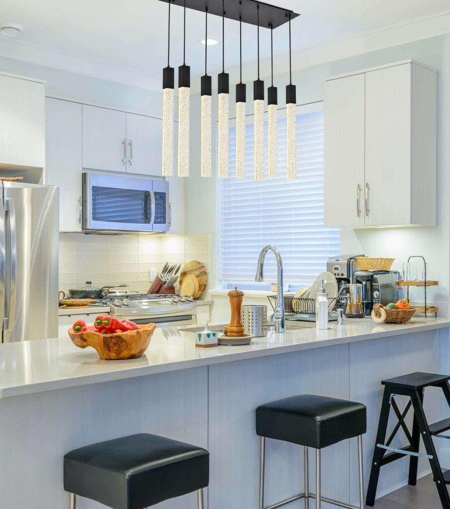 Weston Black Crystal Pendant Chandelier 8-Light 36 Inch: Weston Black Crystal Pendant Chandelier 8-Light 36 Inch This modern black crystal pendant chandelier from the Weston Collection features a sleek, polished finish and clear seeded crystal bar lights, c
