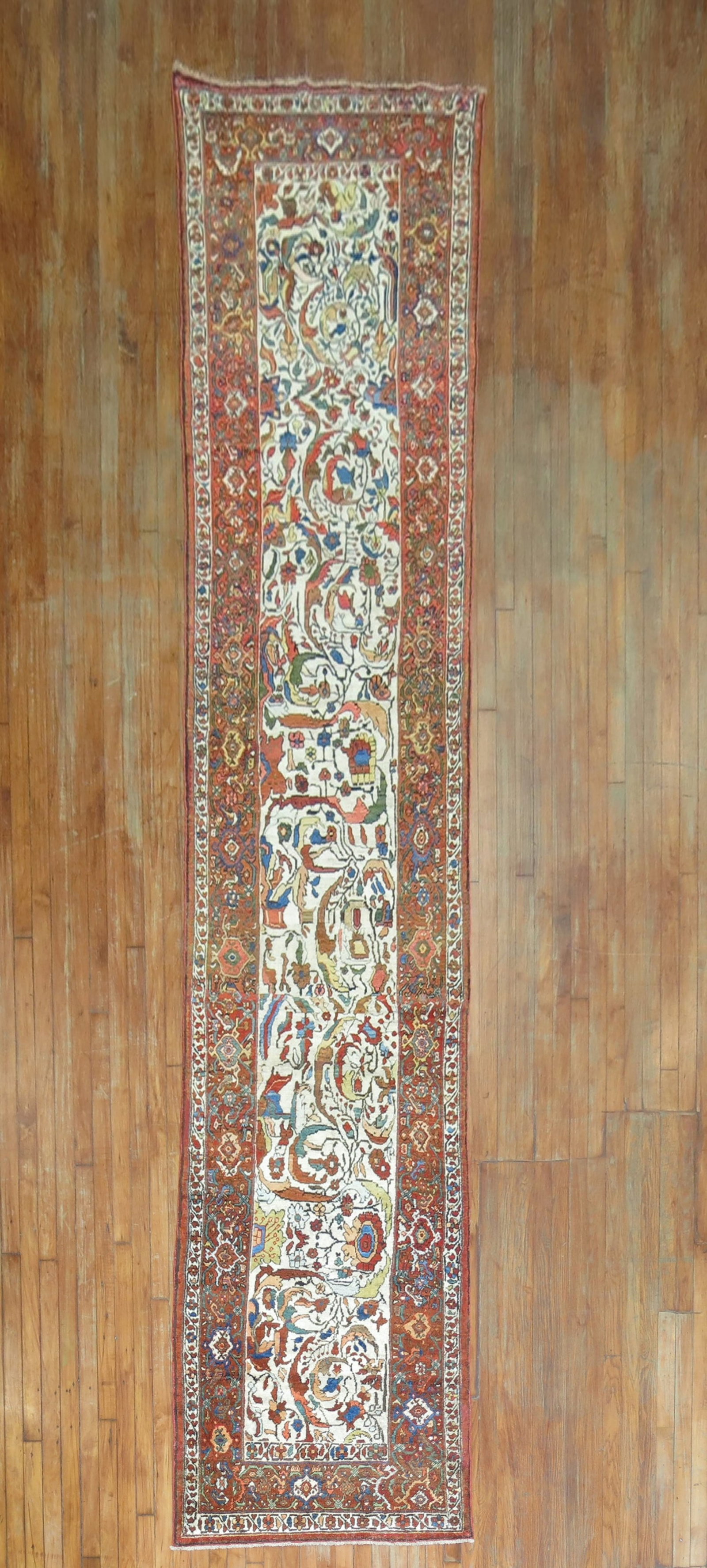 2' 11" x 15' 1" Early 20th Century Persian Runner: 2' 11" x 15' 1" Early 20th Century Persian Runner Early 20th century Persian runner with an ivory field and intricate patterned design. This pre-owned rug is categorized as a runner. Specifications Ty