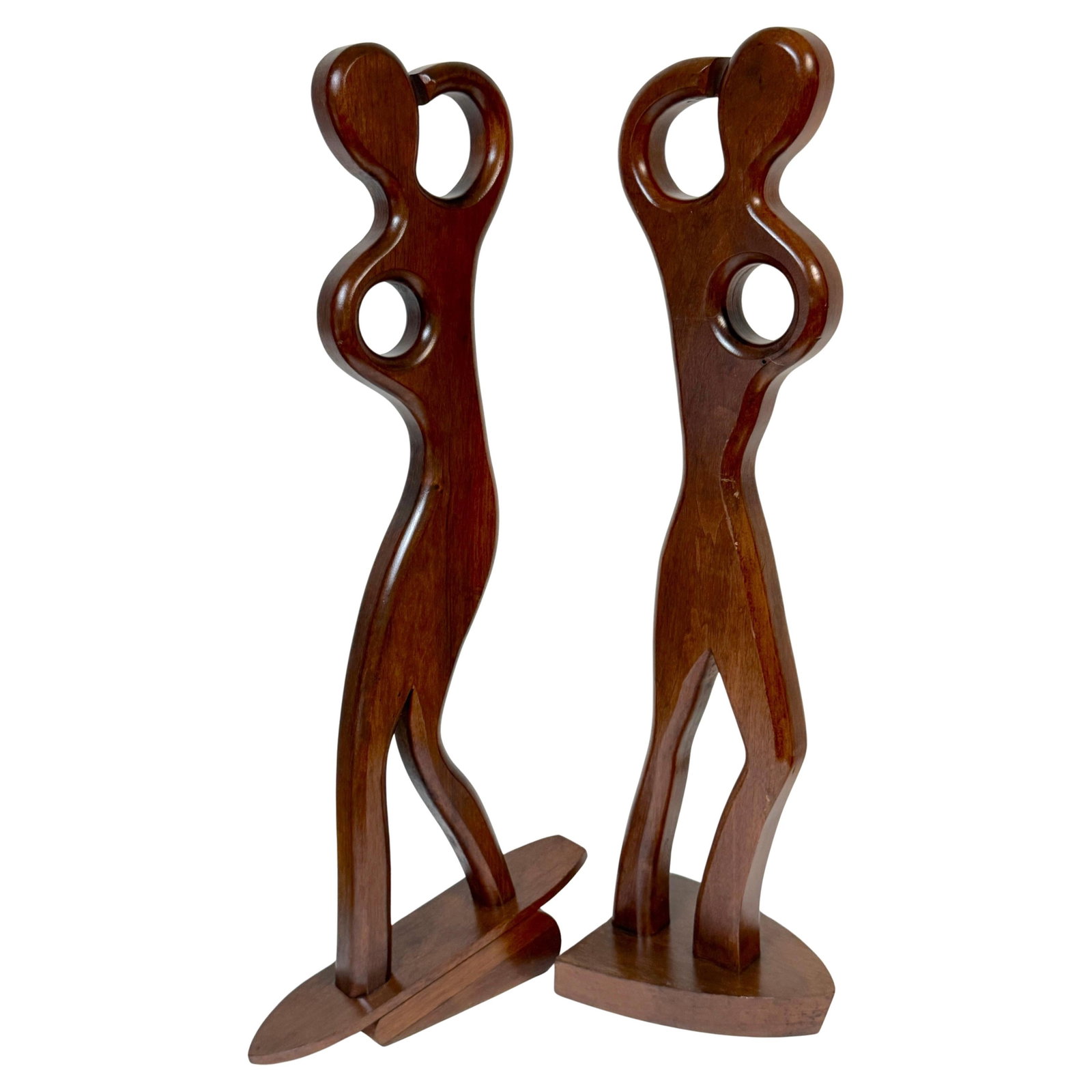 Mid-Century Modern Teak Sculptures Set by William Westenhaver for Witco: Mid-Century Modern Teak Sculptures Set by William Westenhaver for Witco This captivating pair of Mid-Century Modern sculptures, attributed to William Westenhaver for Witco, features the dynamic