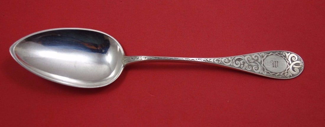 Vanderslice Shreve Celtic Sterling Silver Serving Spoon 8 3/8 Inches: Vanderslice Shreve Celtic Sterling Silver Serving Spoon 8 3/8 Inches Sterling silver serving spoon from the Celtic pattern collection by Vanderslice / Shreve, measuring 8 3/8 inches in length. This pr