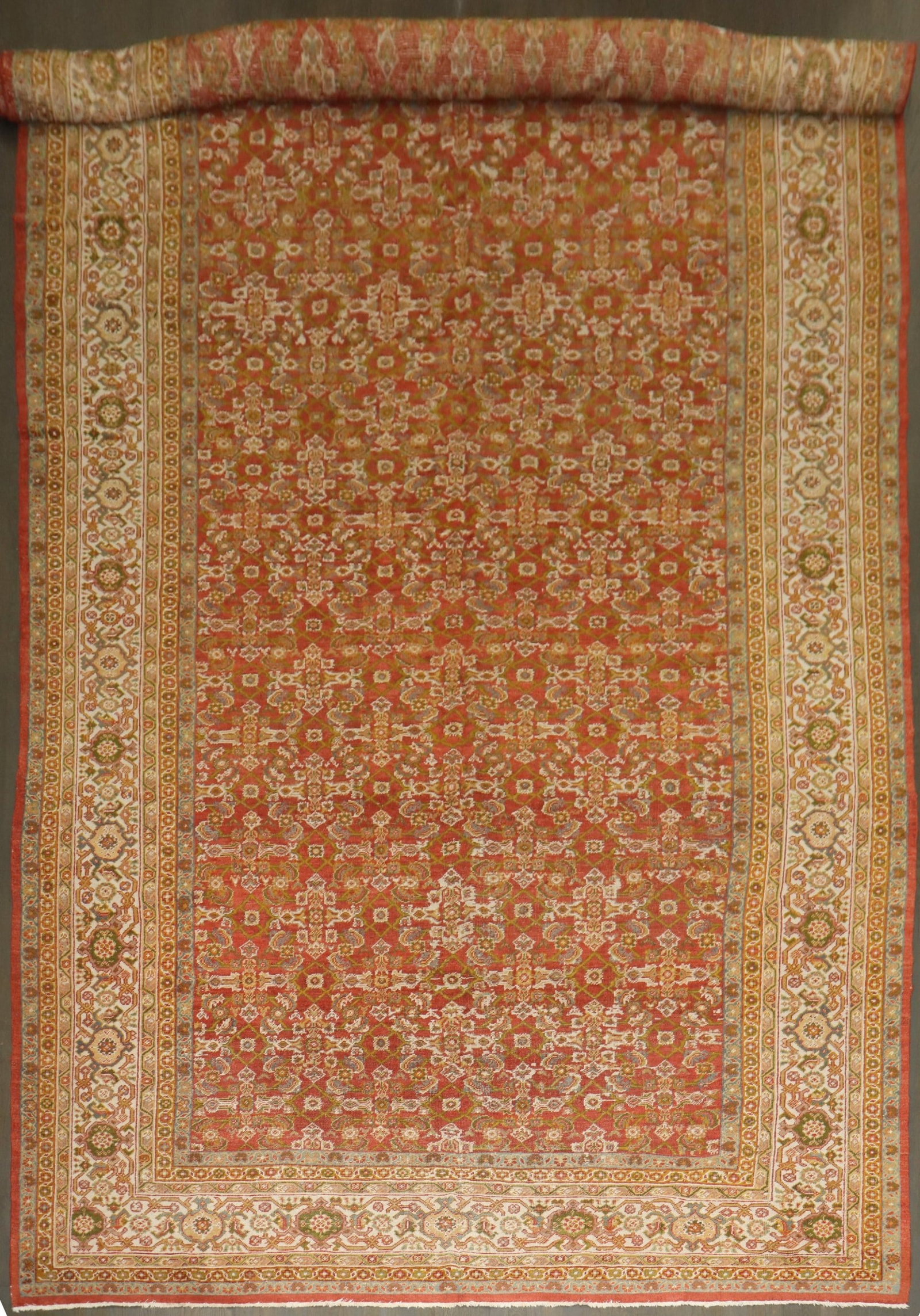 9' 4" x 18' 4" Persian Mahal gallery rug Herati ivory on red: 9' 4" x 18' 4" Persian Mahal gallery rug Herati ivory on red Rare-size 1920s Persian Mahal wide gallery oversize rug featuring a Herati ivory-colored pattern and border on a red ground. This pre-owned
