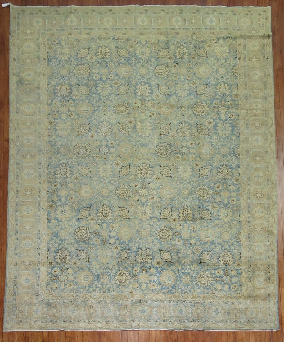 9' 5" x 12' 10" Persian Tabriz room rug in sky blue: 9' 5" x 12' 10" Persian Tabriz room rug in sky blue Early 20th century Persian Tabriz rug in a room-size format. The rug is presented in a sky blue palette and is listed as pre-owned. Specifications T