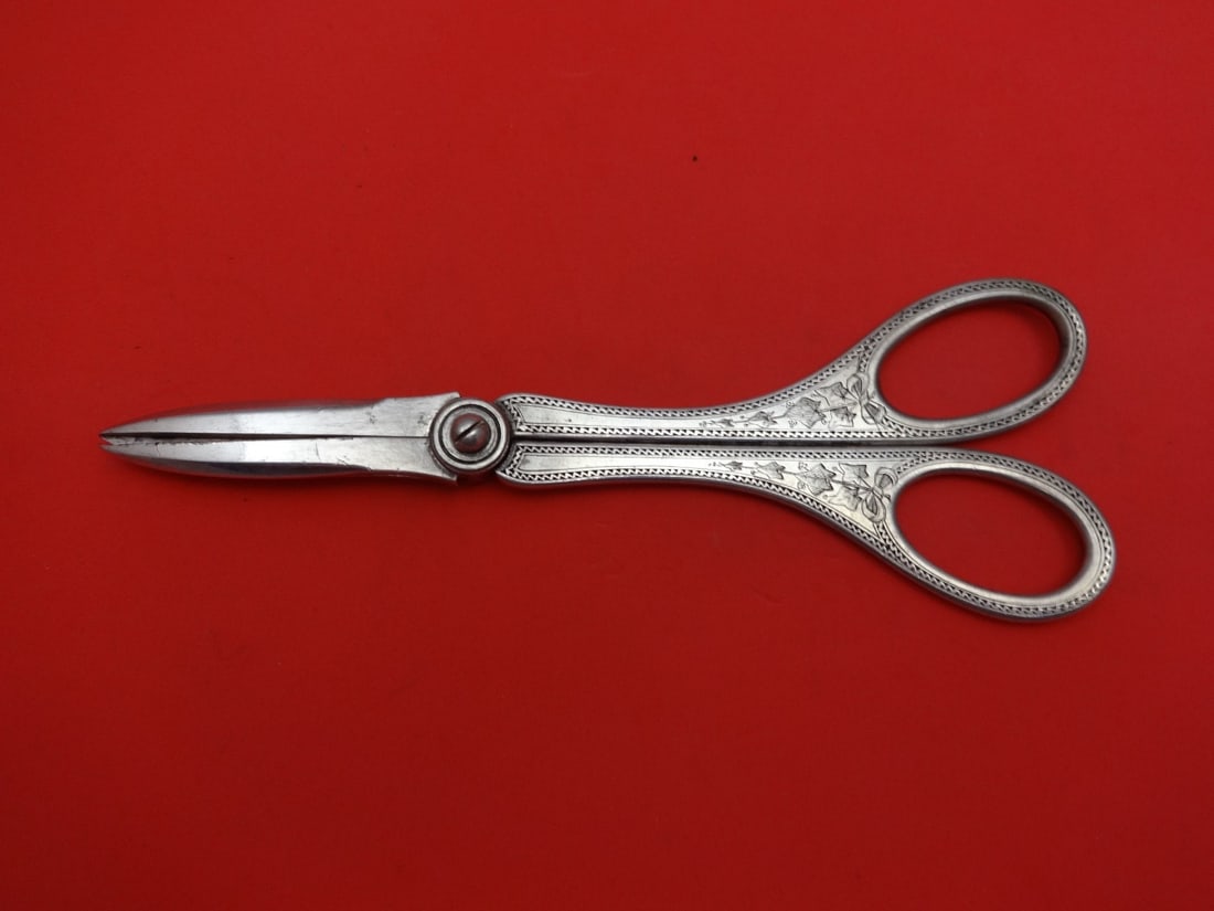 Tiffany & Co. Sterling Silver Antique Ivy Grape Shears Christmas 1877 7 Inch: Tiffany & Co. Sterling Silver Antique Ivy Grape Shears Christmas 1877 7 Inch This exquisite pair of grape shears, crafted by Tiffany & Co., features the iconic Ivy pattern, also known as Antique Ivy, 