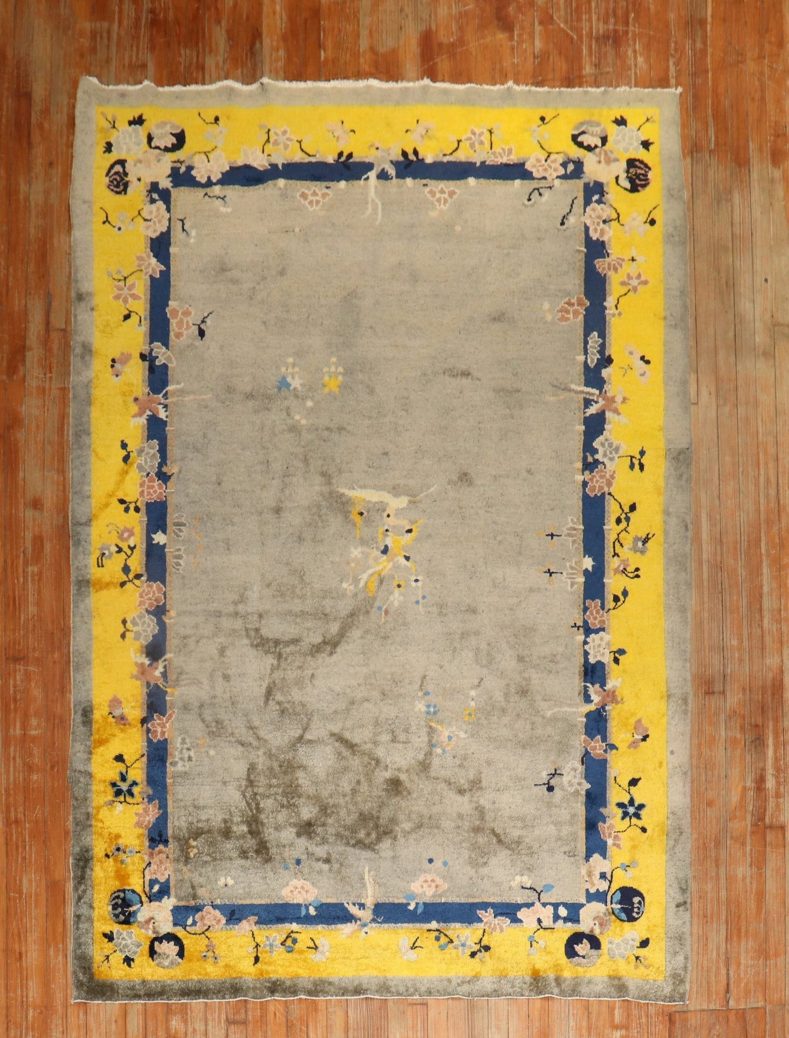 6' x 8' 7" Antique Chinese Deco Peking Rug: 6' x 8' 7" Antique Chinese Deco Peking Rug Antique Chinese Peking rug with a rare silver and yellow color combination and a floral border design. This pre-owned piece was found in a California estate 