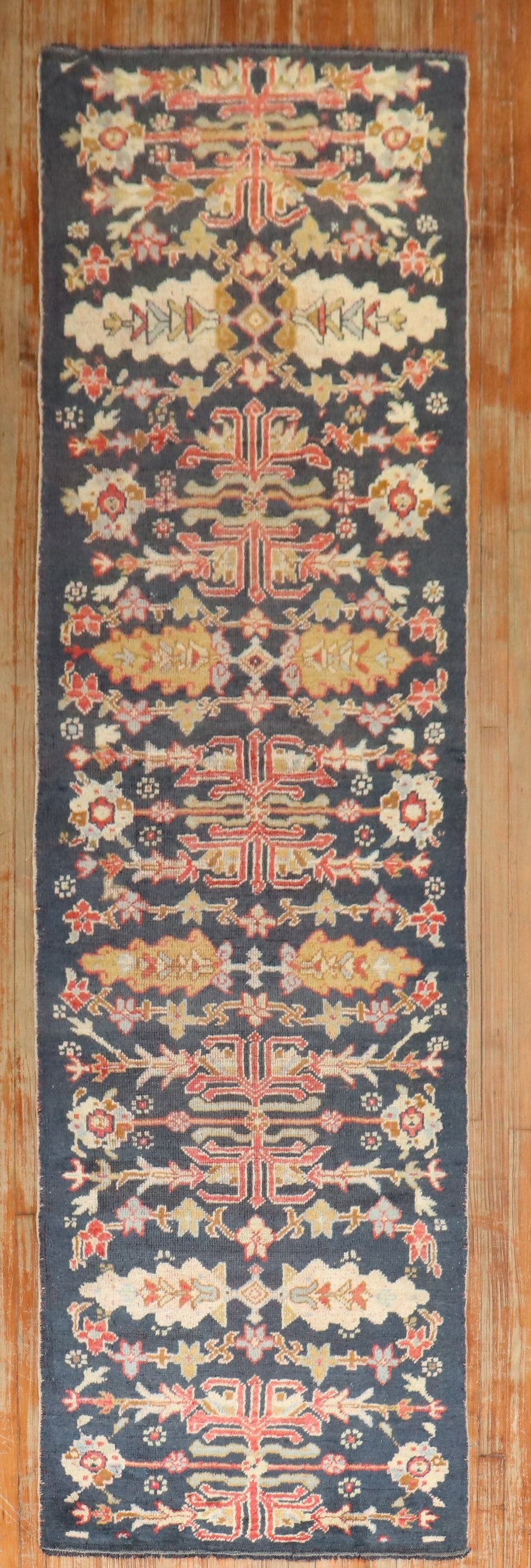 Early 20th Century Oushak Rug Runner 3' x 10' 10": Early 20th Century Oushak Rug Runner 3' x 10' 10" An early 20th century Oushak runner with a long, narrow profile and a geometric pattern. Offered as a pre-owned rug. Specifications Type: Oushak Categ