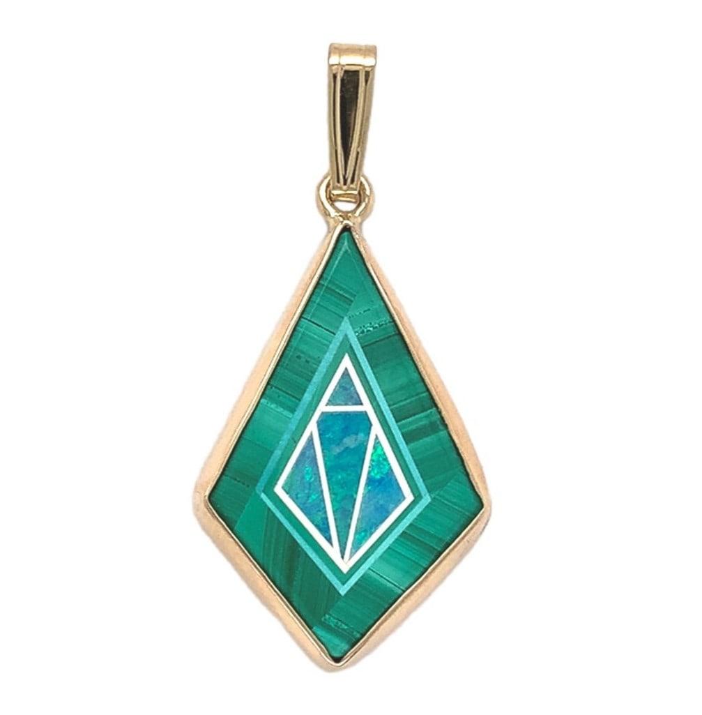 14k Yellow Gold Malachite Opal Turquoise Inlay Kite Pendant: 14k Yellow Gold Malachite Opal Turquoise Inlay Kite Pendant Showcasing a stunning kite-shaped design, this pendant features a vibrant combination of genuine malachite, opal, and turquoise inlay. Craft