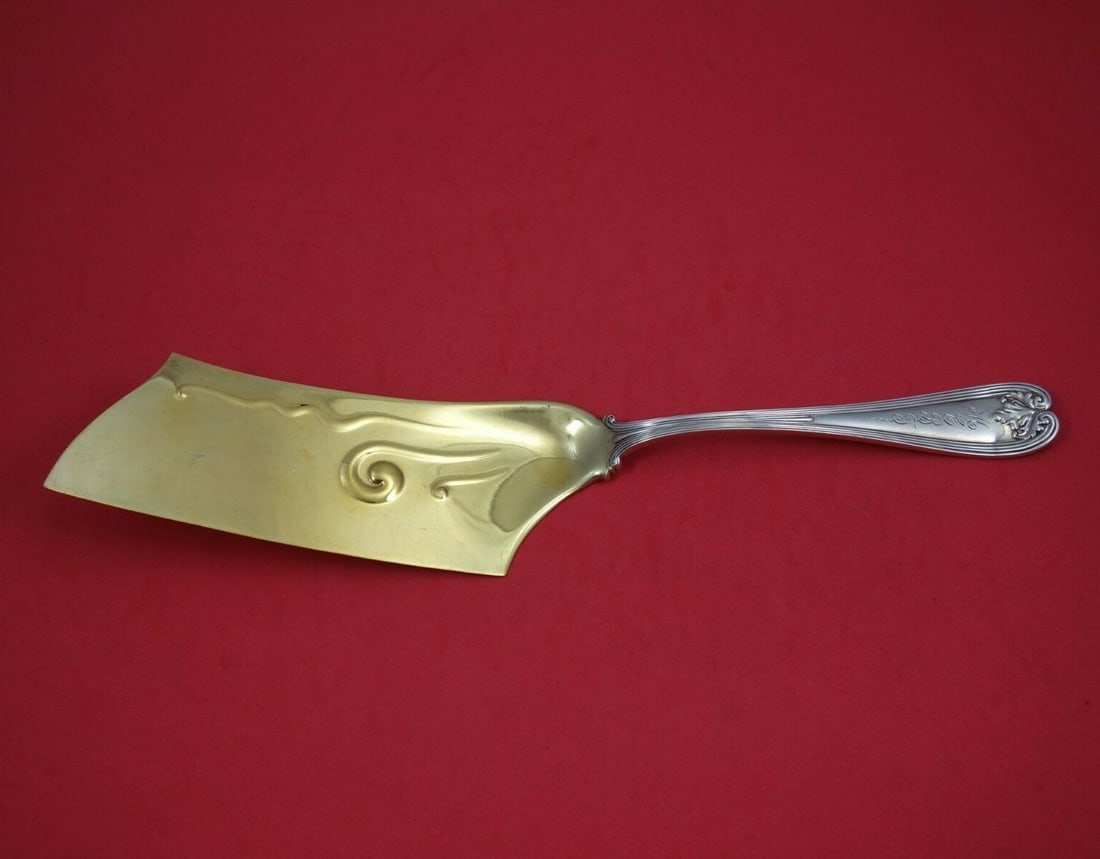 Tiffany & Co Colonial Sterling Silver Ice Cream Slice 12 Gold Washed Hatchet Style: Tiffany & Co Colonial Sterling Silver Ice Cream Slice 12 Gold Washed Hatchet Style This exquisite 12" ice cream slice from Tiffany & Co. is crafted in sterling silver and features the elegant Colonial