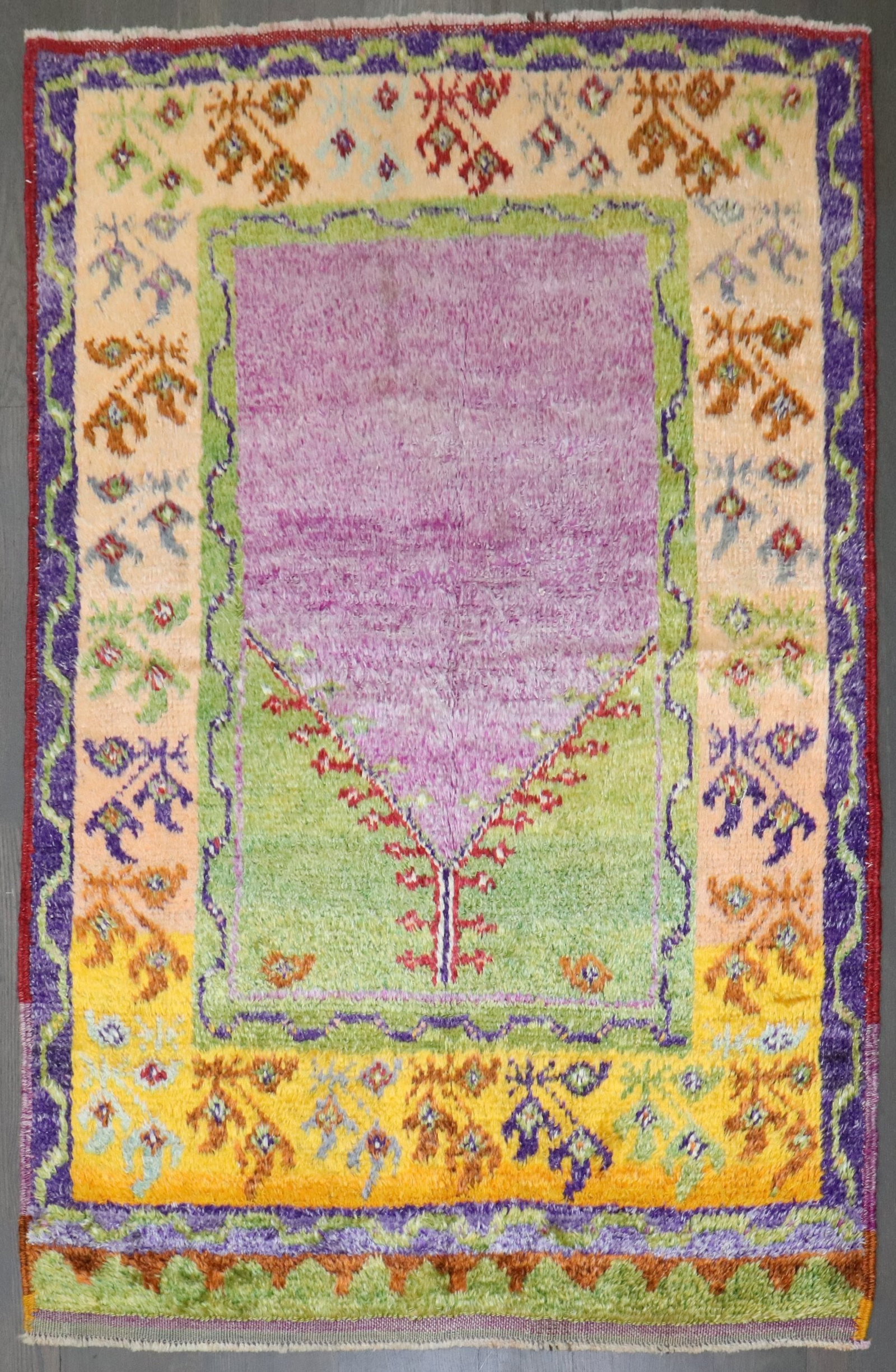 3' 5" x 4' 11" Anatolian Konya Turkish Prayer Rug: 3' 5" x 4' 11" Anatolian Konya Turkish Prayer Rug Mid-20th century Turkish prayer rug with a small-format design and plush pile. This pre-owned piece features wild colors and is identified as an Anato