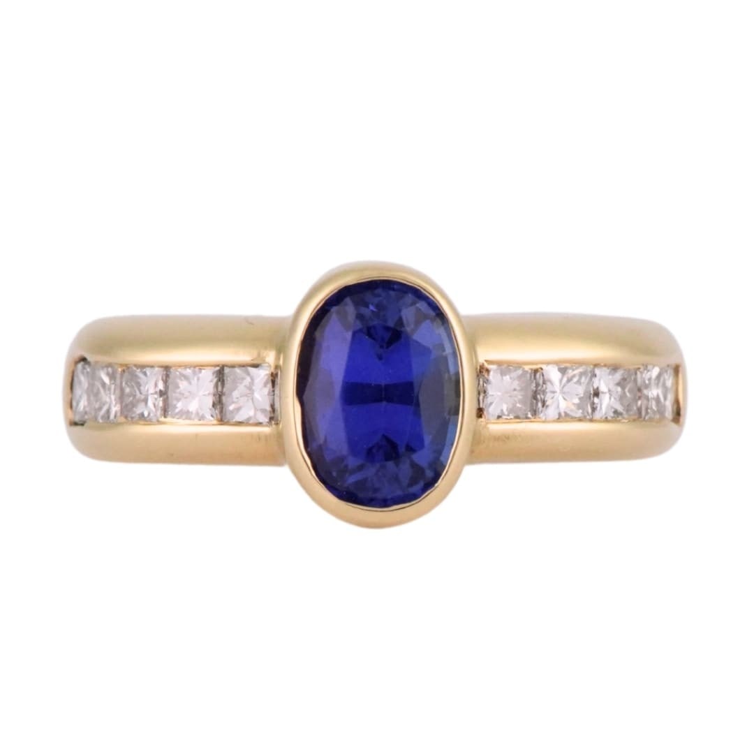 Unbranded 18K Yellow Gold Ring with Oval Tanzanite and Princess Cut Diamonds (1 of 7)