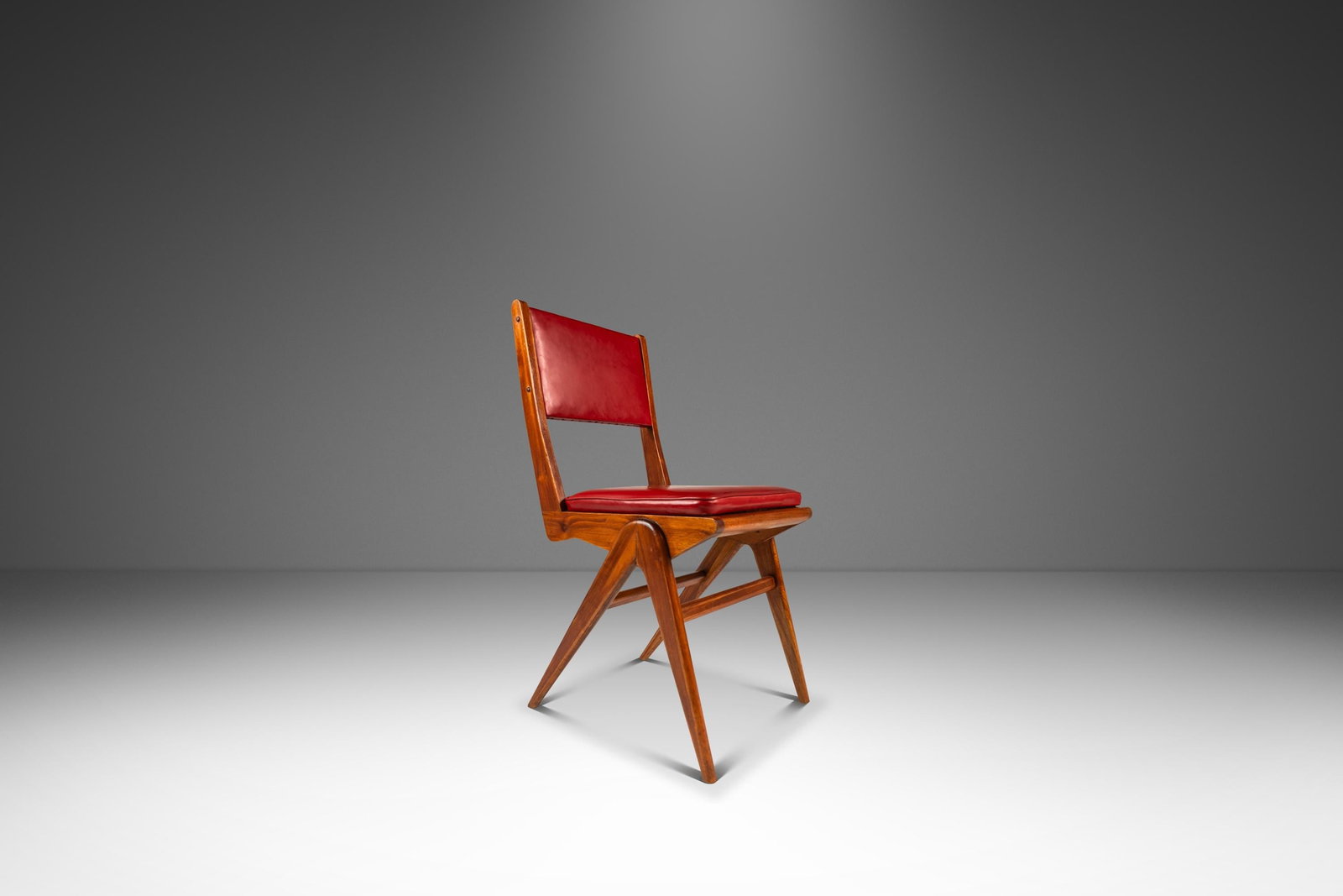 1960s Italian Mid-Century Modern Walnut Accent Chair After Carlo de Carli: 1960s Italian Mid-Century Modern Walnut Accent Chair After Carlo de Carli Discover a stunning Italian Mid-Century Modern angular accent chair, inspired by the designs of Carlo de Carli. This unique pi