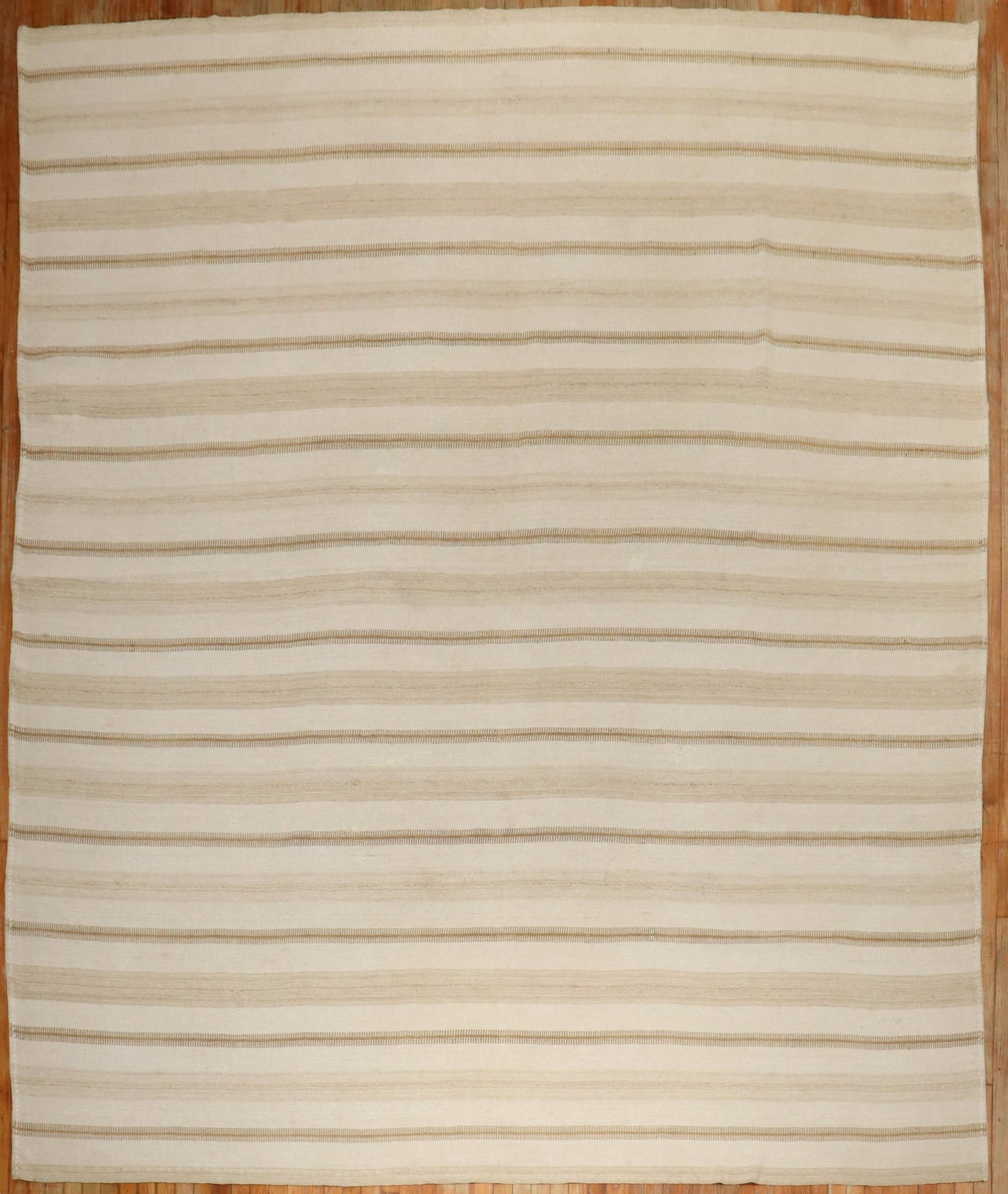 10' x 11' 7" Turkish Kilim Rug in Cream and Brown: 10' x 11' 7" Turkish Kilim Rug in Cream and Brown Mid-20th century Turkish kilim in a cream and brown color palette. This pre-owned room-size rug has a square format and retains the straightforward ch