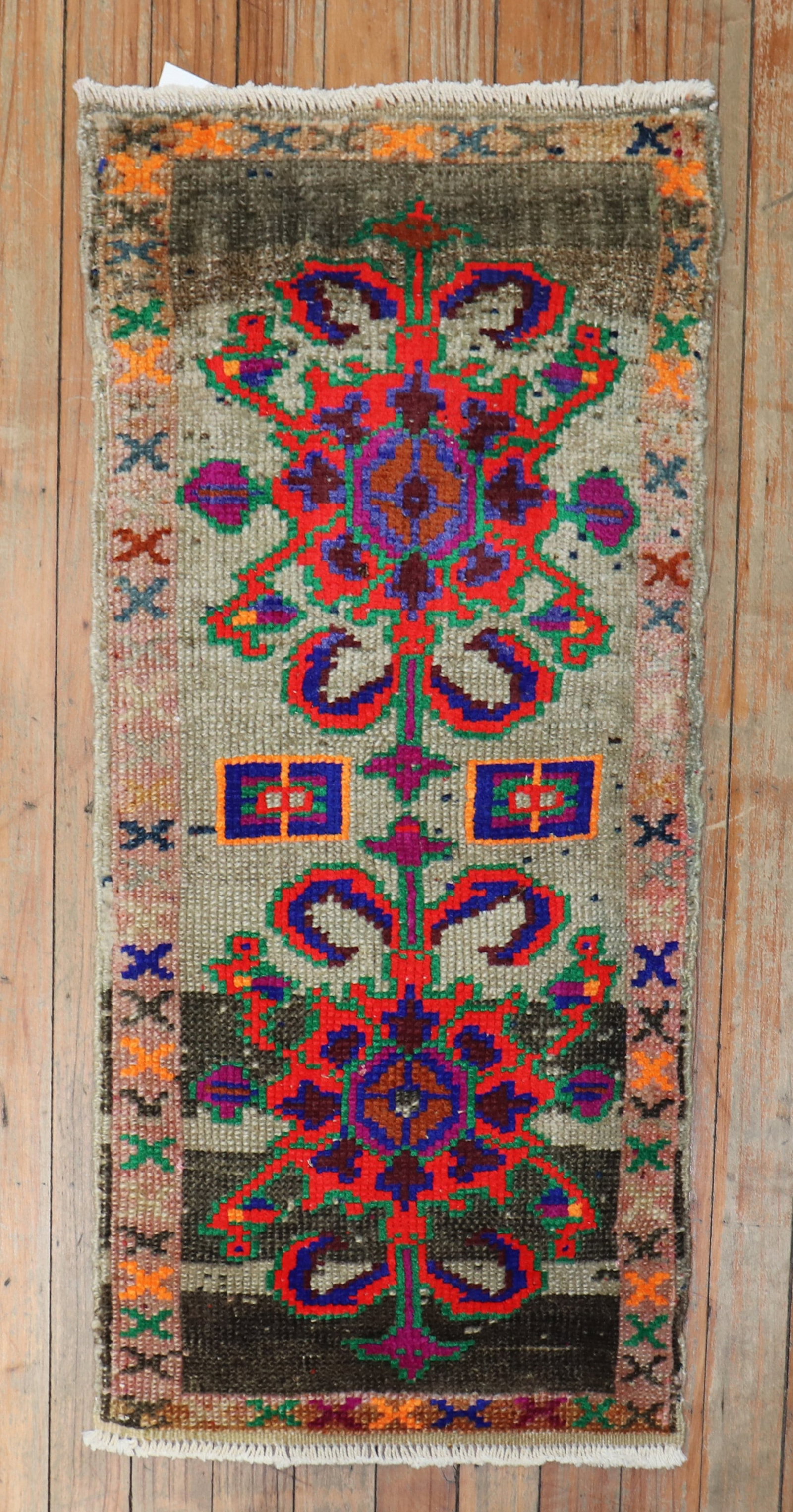 1' 5" x 2' 10" Anatolian Yastik Turkish Rug: 1' 5" x 2' 10" Anatolian Yastik Turkish Rug Mid 20th century eclectic Turkish mini size rug in the Anatolian yastik category. This pre-owned piece features a colorful patterned design with floral and 