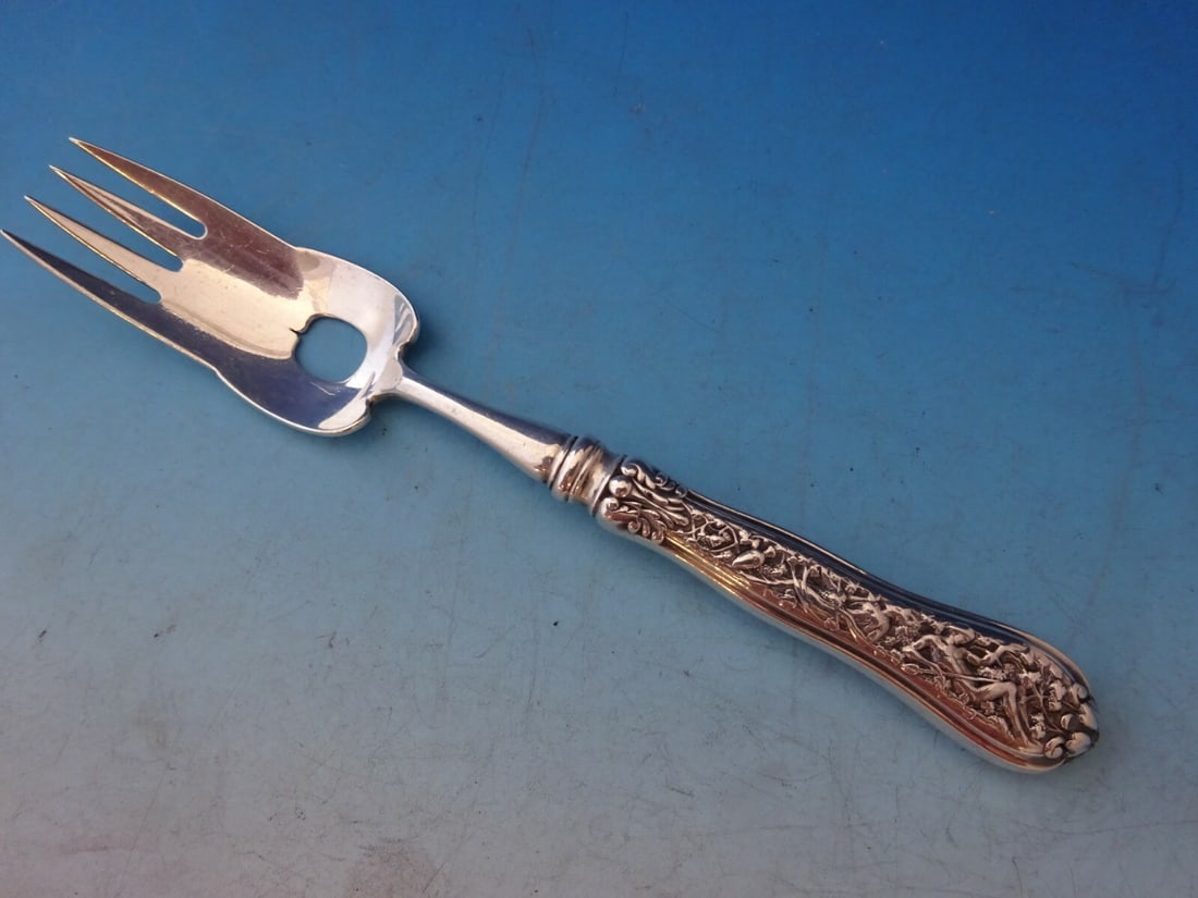 Rare Tiffany & Co Olympian Sterling Silver Fish Fork 6 3/4 Inch: Rare Tiffany & Co Olympian Sterling Silver Fish Fork 6 3/4 Inch Presenting a rare Olympian pattern fish fork by Tiffany & Co., crafted from high-quality sterling silver. This elegant piece measures 6 