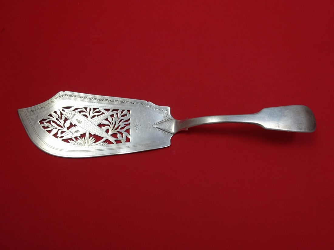 Tipped Sterling Silver Fish Server 11 3/4 Bright-Cut Design: Tipped Sterling Silver Fish Server 11 3/4 Bright-Cut Design This exquisite fish server is crafted from high-quality sterling silver and features a beautiful pierced bright-cut design adorned with two 