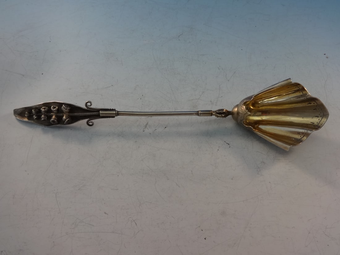 Wood & Hughes Sterling Silver 8" Lily of the Valley Serving Scoop: Wood & Hughes Sterling Silver 8" Lily of the Valley Serving Scoop This exquisite serving scoop features the "Lily of the Valley" pattern by Wood & Hughes, showcasing a beautifully detailed 3-D floral 
