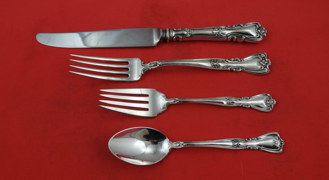 Watson Victoria New Sterling Silver 4-Piece Flatware Set: Watson Victoria New Sterling Silver 4-Piece Flatware Set Discover the elegance of the Victoria New 4-piece setting by Watson, crafted from high-quality sterling silver. This exquisite set includes a m