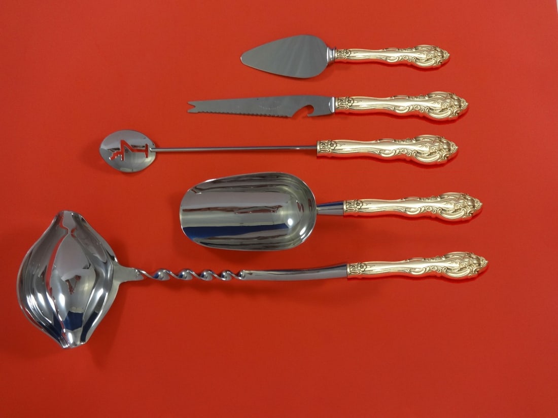 Gorham La Scala Sterling Silver 5pc Cocktail Serving Set: Gorham La Scala Sterling Silver 5pc Cocktail Serving Set Elevate your cocktail parties with this exquisite 5-piece La Scala Hostess Set by Gorham. Crafted from sterling silver, this custom-made servin