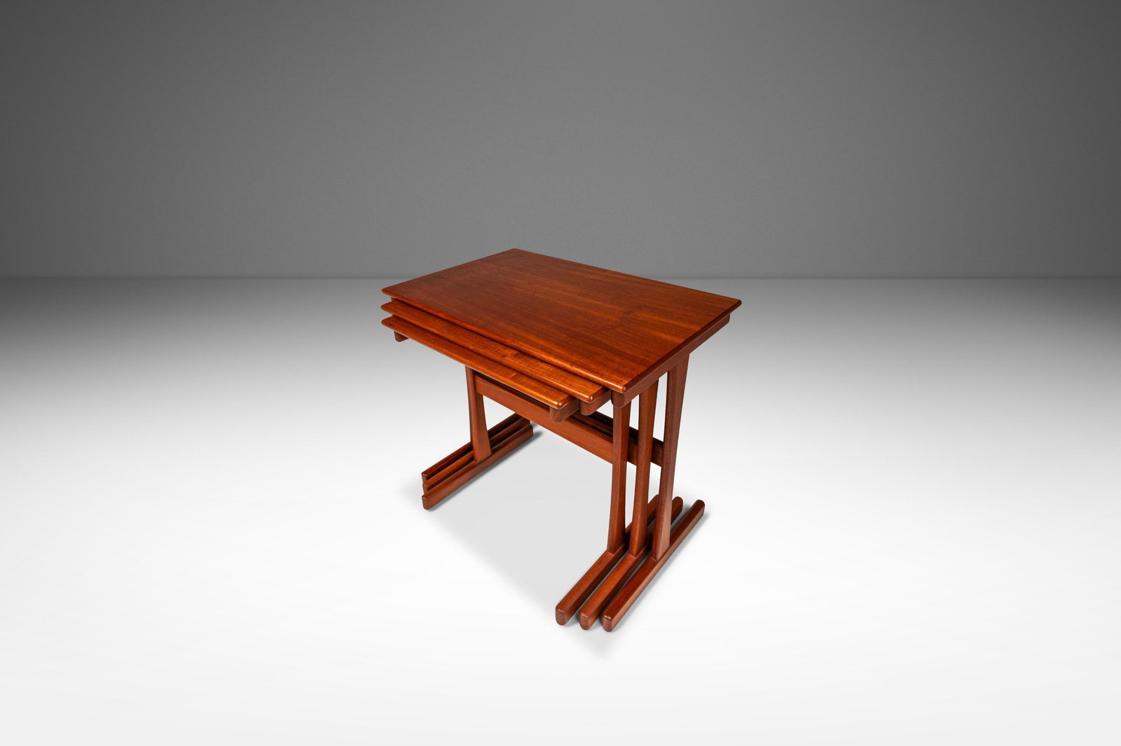 Kai Kristiansen Set of 3 Teak Nesting Tables 1960s Danish Modern Vildbjerg Mobelfabrik: Kai Kristiansen Set of 3 Teak Nesting Tables 1960s Danish Modern Vildbjerg Mobelfabrik Introducing a stunning set of three Danish Mid-Century Modern nesting tables designed by the renowned Kai Kristia
