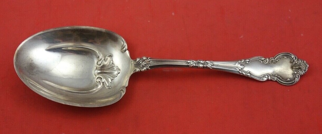 Mauser-Wendell Junior Rococo Sterling Silver Berry Spoon 8 1/2": Mauser-Wendell Junior Rococo Sterling Silver Berry Spoon 8 1/2" This exquisite Junior Rococo berry spoon, crafted by Mauser-Wendell, showcases a stunning design in its bowl. Made of high-quality sterl