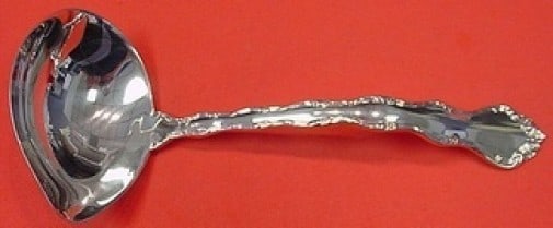 Reed and Barton Tara Sterling Silver Gravy Ladle 6.5 Inch Serving Piece: Reed and Barton Tara Sterling Silver Gravy Ladle 6.5 Inch Serving Piece This exquisite gravy ladle from the Tara pattern by Reed and Barton is crafted from high-quality sterling silver. Measuring 6 1/
