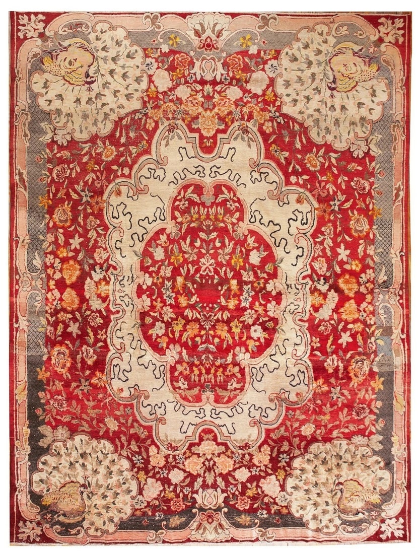 Antique hand knotted Persian Tabriz peacock wool rug 11x15: Antique hand knotted Persian Tabriz peacock wool rug 11x15 This rare antique Persian Tabriz rug, dating to circa 1900, features a striking peacock and floral medallion design in rich red, ivory, soft 