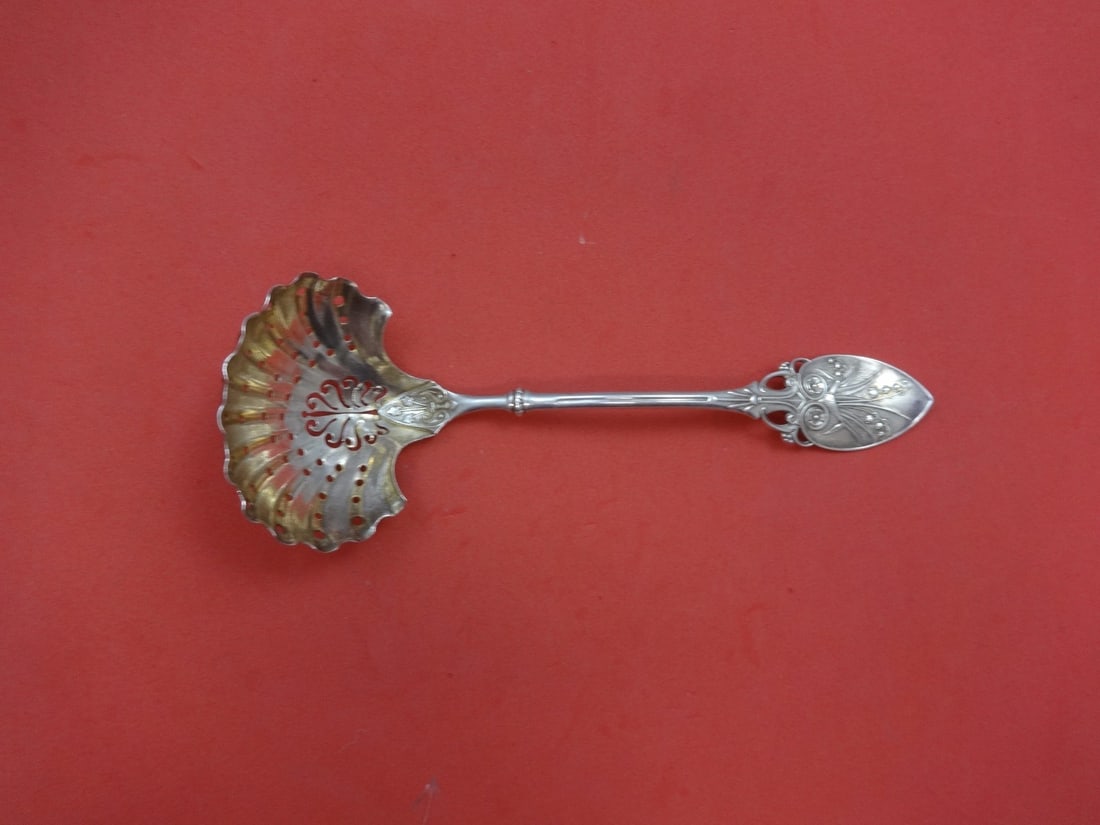 Gorham Lily aka 88 Sterling Silver Sugar Sifter Ladle Gold Washed 6.5": Gorham Lily aka 88 Sterling Silver Sugar Sifter Ladle Gold Washed 6.5" Introducing the exquisite Lily aka 88 by Gorham Sterling Silver Sugar Sifter Ladle, elegantly gold washed and measuring 6 1/2 inc