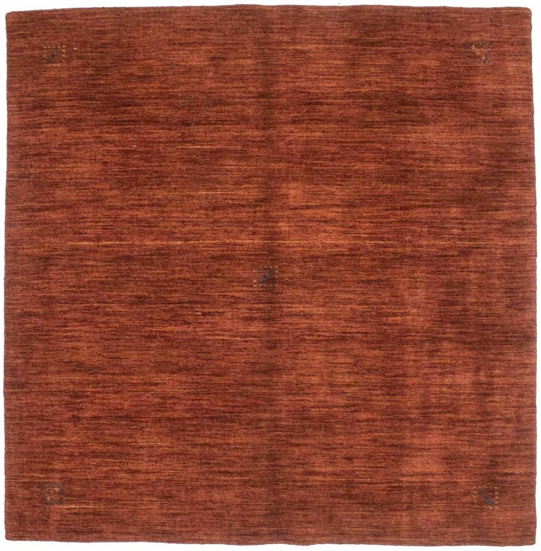 Square Hand-Loomed Wool Rug Modern Tribal Solid Rusty Red 4'9 x 4'10: Square Hand-Loomed Wool Rug Modern Tribal Solid Rusty Red 4'9 x 4'10 This hand-loomed square oriental rug features a solid rusty red color with a modern tribal design. Crafted from wool using a knotte