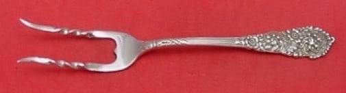Reed & Barton Trajan Sterling Silver Serving Fork 7 1 4 Inch: Reed & Barton Trajan Sterling Silver Serving Fork 7 1 4 Inch This is a custom-made sterling silver baked potato serving fork in the Trajan pattern by Reed & Barton. Featuring a decorative design, this