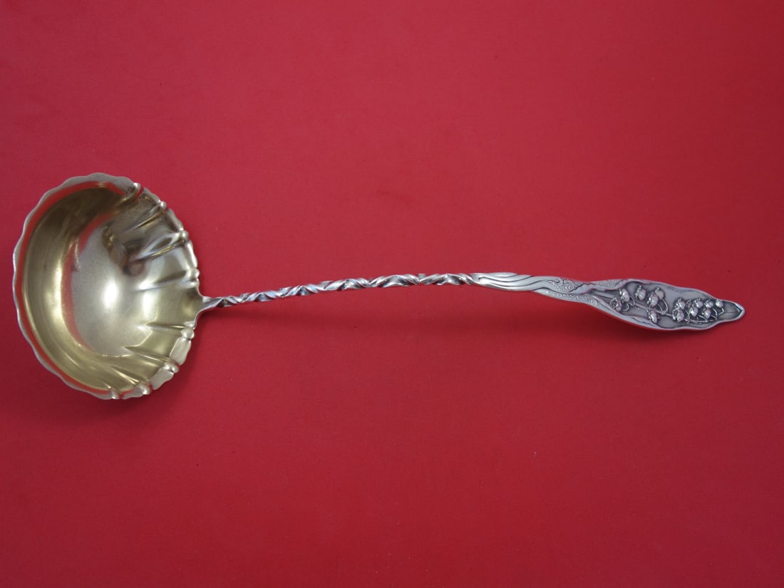 Whiting Sterling Silver Soup Ladle Lily of the Valley 12.25 Gold Wash Stippled Bowl: Whiting Sterling Silver Soup Ladle Lily of the Valley 12.25 Gold Wash Stippled Bowl This exquisite soup ladle, crafted by Whiting, showcases the elegant Lily of the Valley pattern. Made of high-qualit