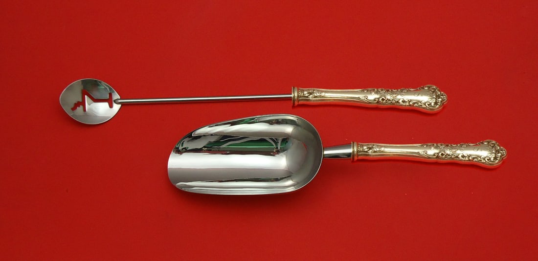 International Sterling Silver Pansy 2pc Bar Set Martini Spoon Ice Scoop: International Sterling Silver Pansy 2pc Bar Set Martini Spoon Ice Scoop Enhance your barware collection with this exquisite 2-piece bar set, crafted from sterling silver by International. This custom-