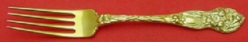 Watson Lily vermeil sterling silver fork 7": Watson Lily vermeil sterling silver fork 7" Sterling silver regular fork in the Lily pattern by Watson, finished in vermeil. This pre-owned piece is not monogrammed and is in excellent condition. Spec