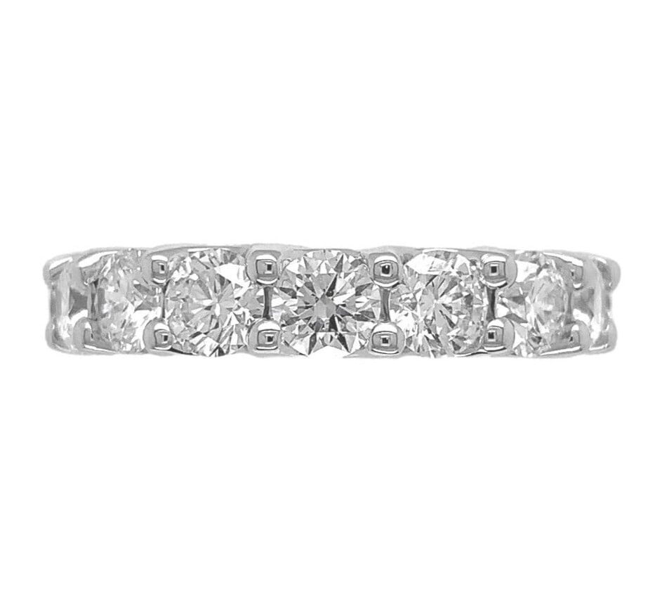 18k White Gold Diamond Eternity Band Size 6.5 16 Stones: 18k White Gold Diamond Eternity Band Size 6.5 16 Stones This elegant eternity band ring is crafted from 18k white gold and features sixteen natural, earth-mined round brilliant cut diamonds with a tot