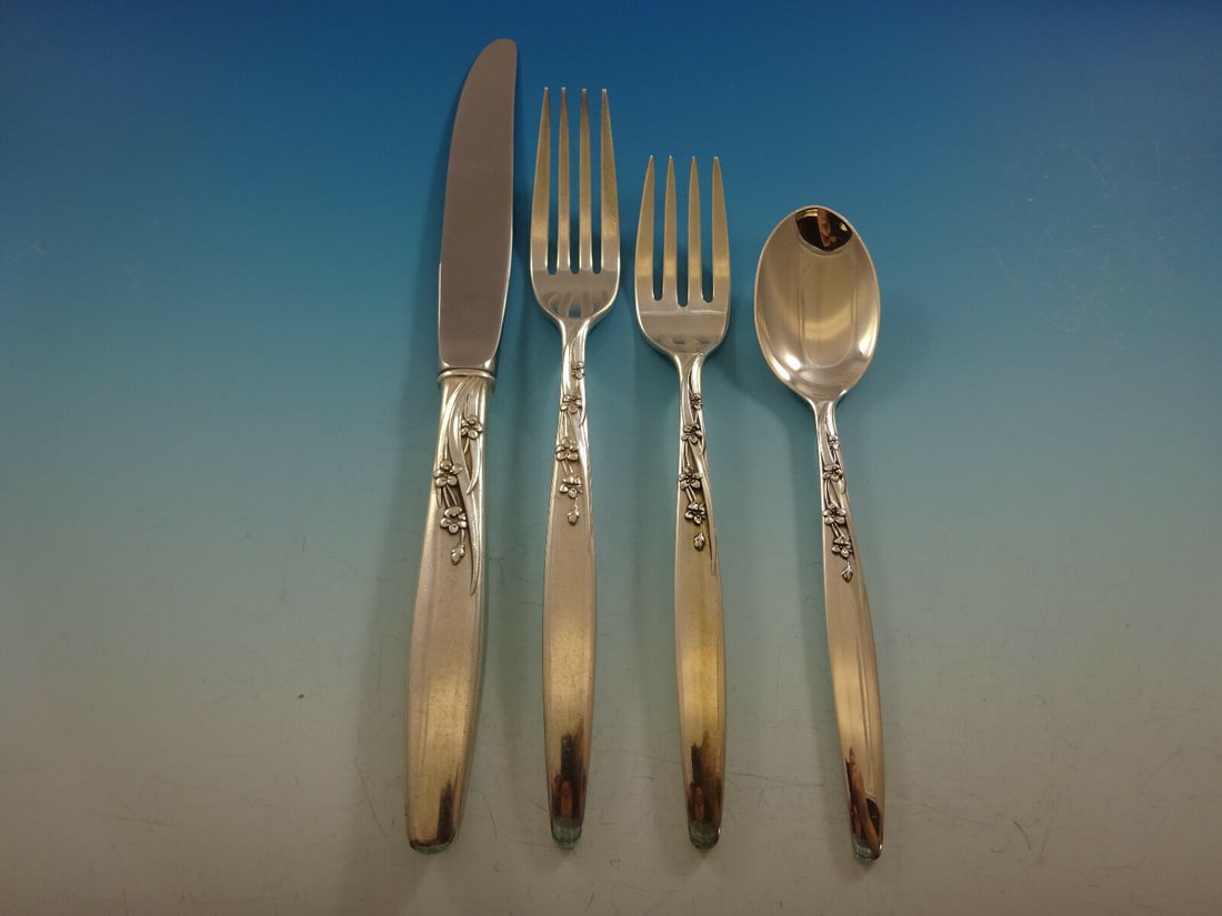 Lunt Sterling Silver Summer Song 4-Piece Place Setting: Lunt Sterling Silver Summer Song 4-Piece Place Setting Enhance your dining experience with this exquisite 4-piece place setting in the Summer Song pattern by Lunt. Crafted from high-quality sterling s