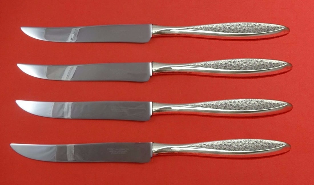 International Sterling Snowflake Custom 4pc Texas Steak Knife Set: International Sterling Snowflake Custom 4pc Texas Steak Knife Set Experience the elegance of dining with the Snowflake Steak Knife Set by International Sterling. This impressive 4-piece set features l