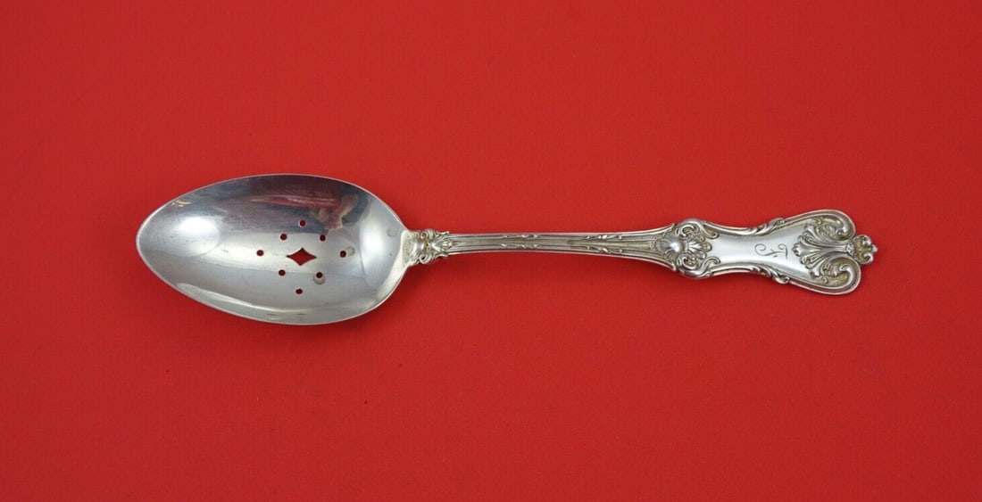 Frank Smith Federal Cotillion Sterling Silver Pierced Serving Spoon 8 1/8": Frank Smith Federal Cotillion Sterling Silver Pierced Serving Spoon 8 1/8" This exquisite serving spoon, crafted by Frank Smith, features the elegant Federal Cotillion pattern. Made of high-quality st