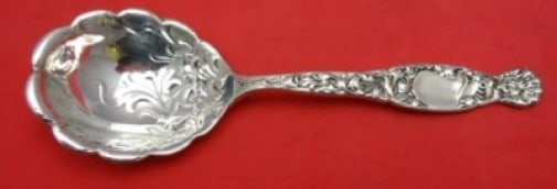 Whiting Heraldic Sterling Silver Preserve Spoon 7 1/4 Fancy Design: Whiting Heraldic Sterling Silver Preserve Spoon 7 1/4 Fancy Design This exquisite preserve spoon features the elegant Heraldic pattern by Whiting Manufacturing Company. Crafted from high-quality sterl
