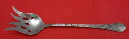 Sterling Silver Grape Pattern Lettuce Serving Fork 8 1 1 8: Sterling Silver Grape Pattern Lettuce Serving Fork 8 1 1 8 This is a sterling silver pierced lettuce fork in the Grape pattern by SSMC-Saart. The fork measures 8 1/8 inches in length and features a mo