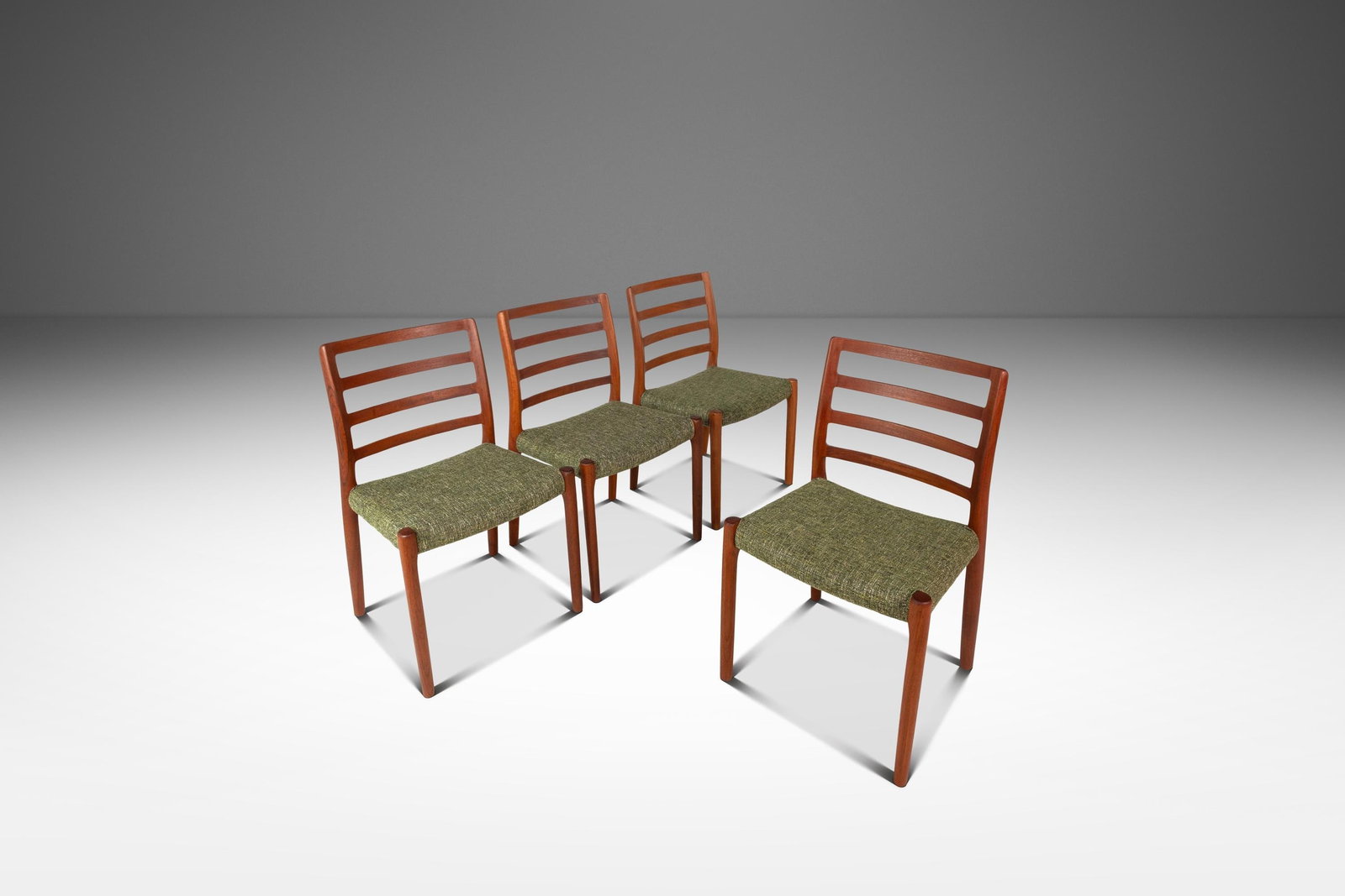 Restored Set of 4 Niels Moller Model 85 Teak Dining Chairs: Restored Set of 4 Niels Moller Model 85 Teak Dining Chairs This exquisite set of four Danish Mid-Century Modern Model 85 ladderback dining chairs, designed by the renowned Niels Moller for J.L. Moller