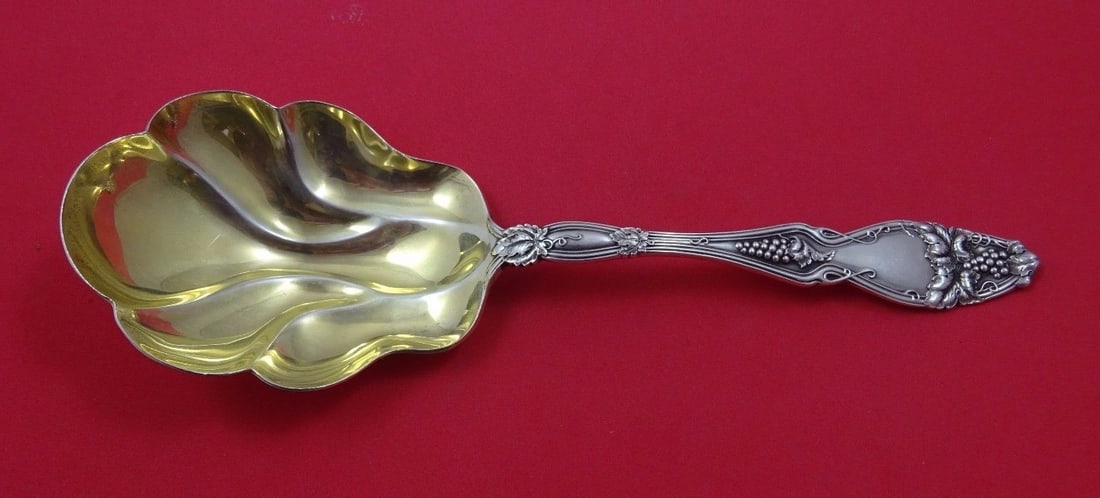 Cloeta International Sterling Silver Berry Spoon Gold Wash 9 Inch Serving: Cloeta International Sterling Silver Berry Spoon Gold Wash 9 Inch Serving This exquisite Cloeta serving spoon is crafted from sterling silver and features a stunning gold wash finish. Measuring 9 inch