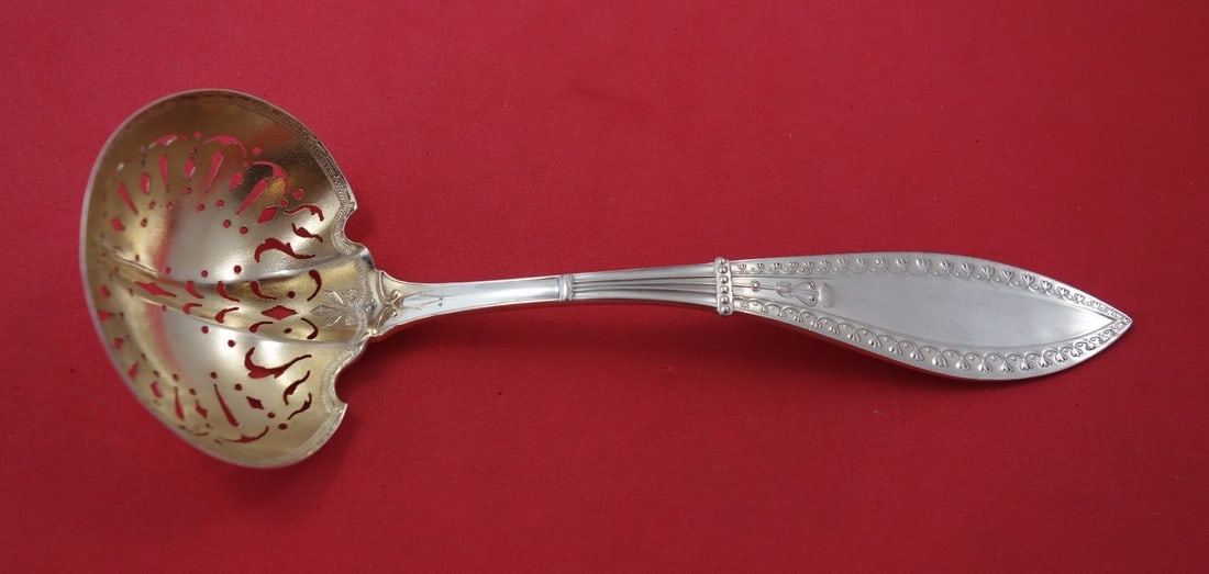 Sterling Silver Sugar Sifter Ladle Schulz & Fischer Olympic 7 3/4: Sterling Silver Sugar Sifter Ladle Schulz & Fischer Olympic 7 3/4 Sterling silver sugar sifter ladle in the Olympic pattern by Schulz & Fischer. It features a gold washed finish, measures 7 3/4 inches