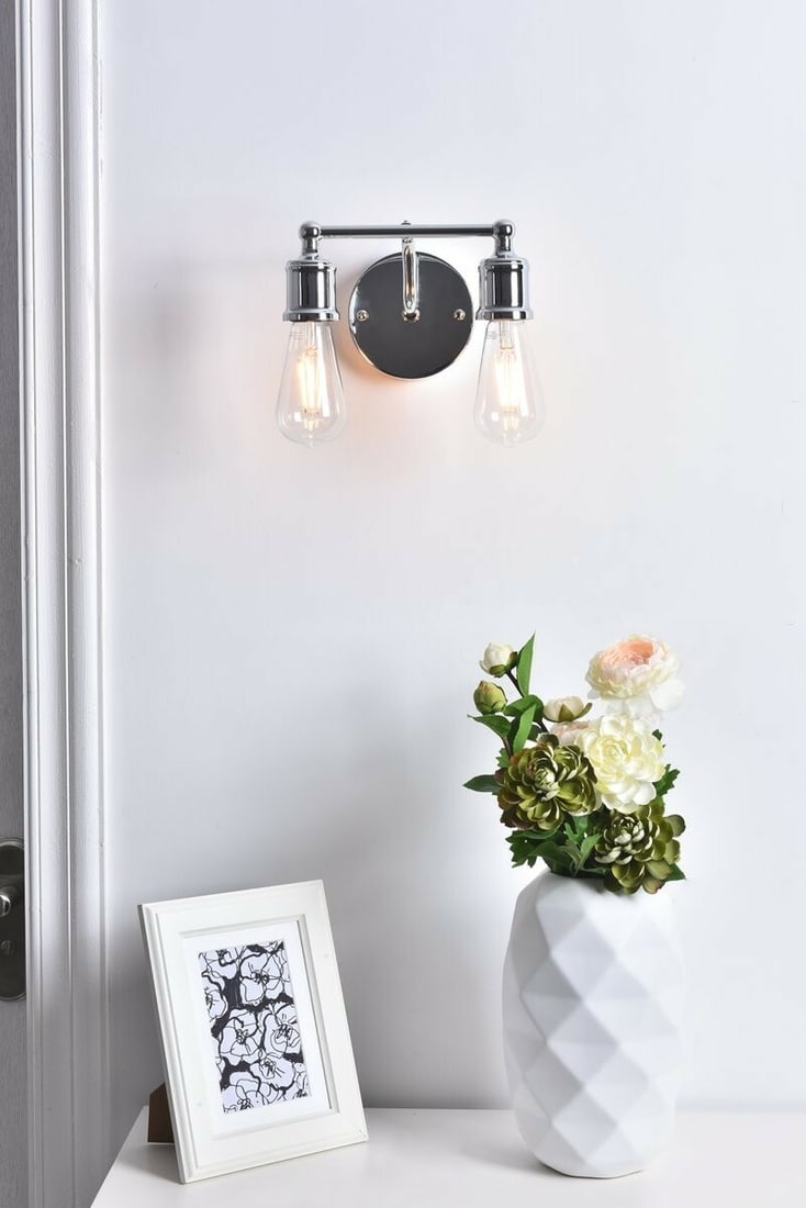 Serif 2-Light Chrome Wall Sconce Hardwired: Serif 2-Light Chrome Wall Sconce Hardwired Pre-owned 2-light wall sconce in a chrome finish with a farmhouse, mid-century modern, industrial, and contemporary style. It is hardwired for indoor install