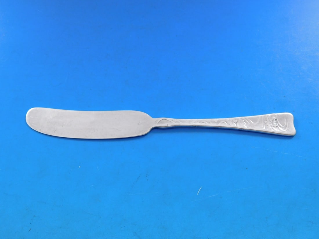 Tiffany & Co Lap Over Edge Acid Etched Sterling Silver Butter Spreader 6": Tiffany & Co Lap Over Edge Acid Etched Sterling Silver Butter Spreader 6" This exquisite butter spreader is crafted by Tiffany & Co. and is part of the Lap Over Edge Acid Etched pattern, dating back t
