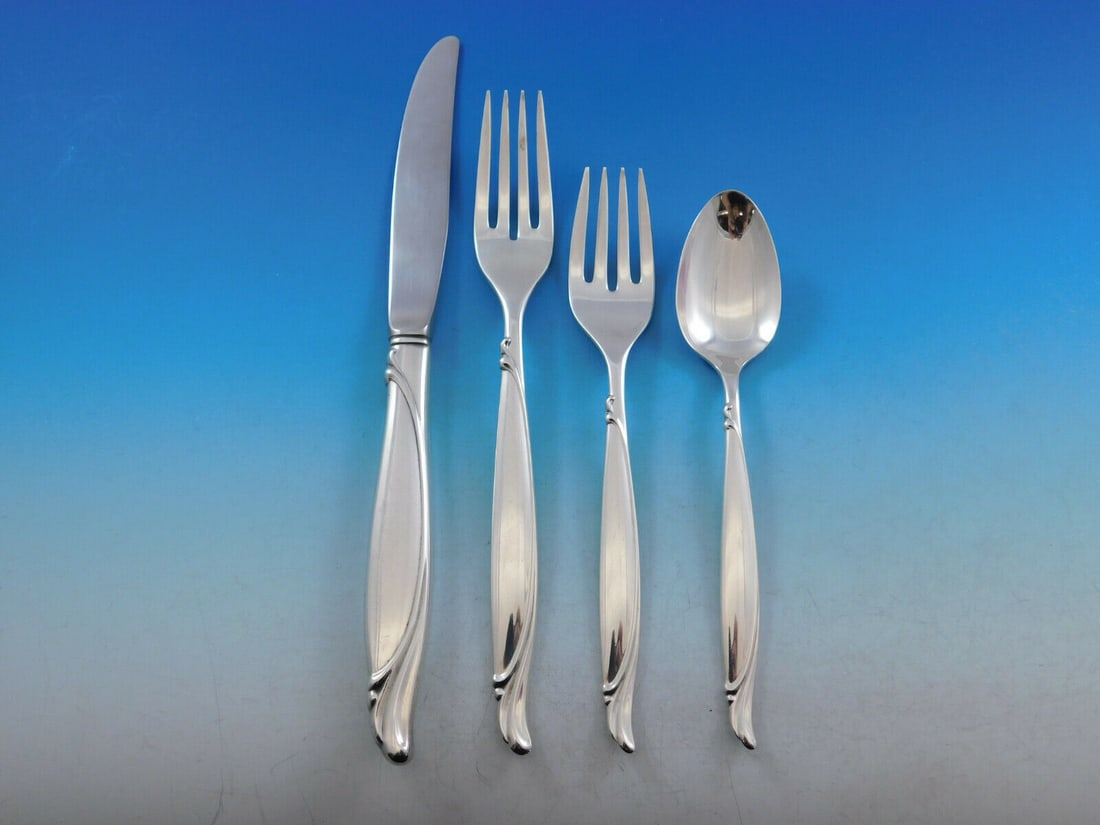 Oneida Sentimental Sterling Silver 4-Piece Place Setting: Oneida Sentimental Sterling Silver 4-Piece Place Setting Experience elegance at your dining table with the Sentimental 4-piece place setting by Oneida. Crafted from high-quality sterling silver, this 