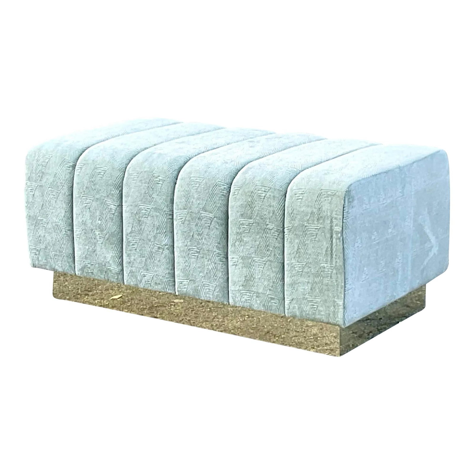 Vintage Boho Channel Tufted Ottoman Celadon Brass Plinth: Vintage Boho Channel Tufted Ottoman Celadon Brass Plinth Embrace vintage charm with this striking Boho channel tufted ottoman. This chic piece features a wrap-around laminated brass plinth, showcasing