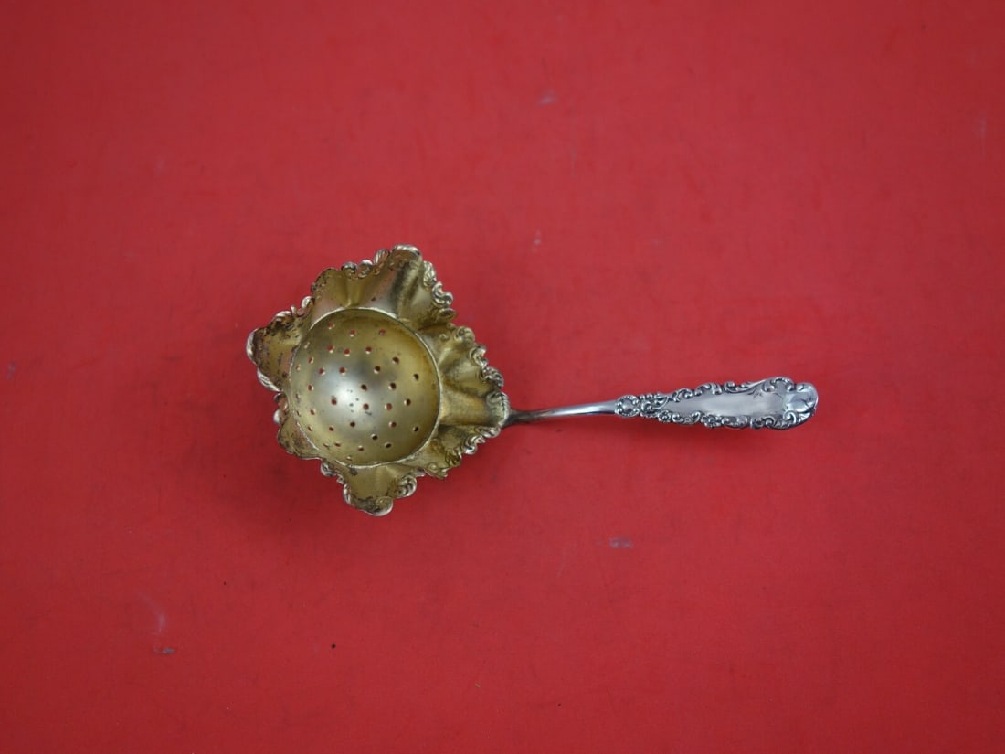 Wallace Waverly Sterling Silver Tea Strainer 5.5 inches: Wallace Waverly Sterling Silver Tea Strainer 5.5 inches This exquisite Waverly tea strainer by Wallace showcases the elegance of sterling silver craftsmanship. Measuring 5 1/2 inches, this piece featu