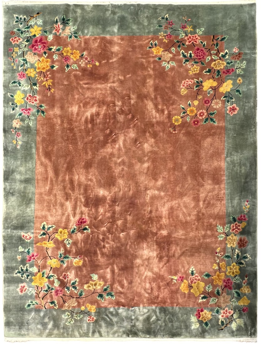 274 cm x 351 cm Chinese Art Deco wool rug attributed to Walter Nichols: 274 cm x 351 cm Chinese Art Deco wool rug attributed to Walter Nichols Antique Chinese Art Deco area rug in a 9 x 12 size, featuring a hand-knotted wool construction and a floral Art Deco design. It i