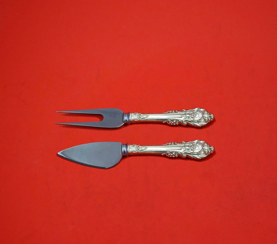 2 Piece Sir Christopher Sterling Silver Cheese Serving Set Wallace: 2 Piece Sir Christopher Sterling Silver Cheese Serving Set Wallace This two-piece hard cheese serving set is crafted in the Sir Christopher pattern by Wallace. The set features sterling silver hollow 