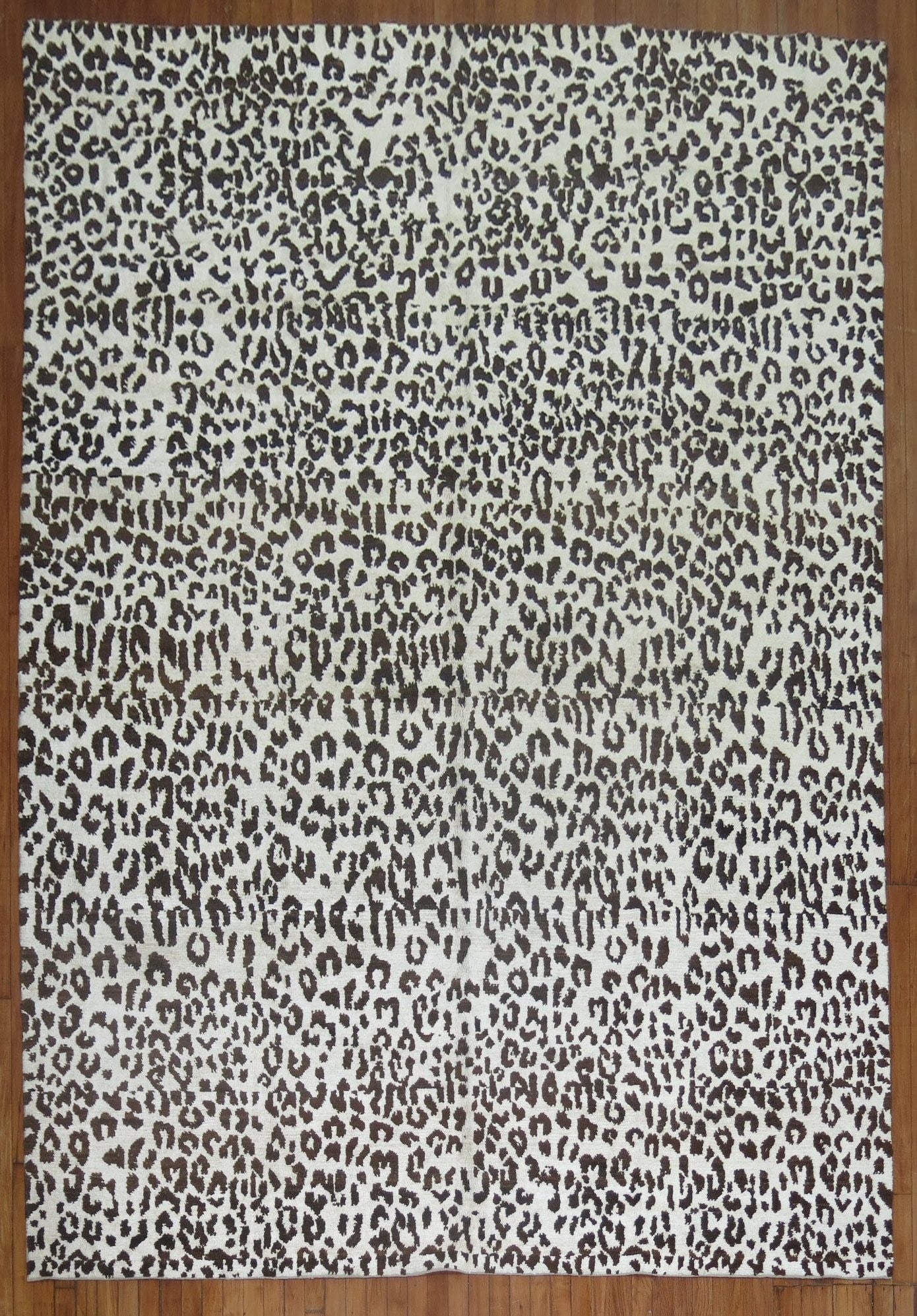 8' 1" x 10' 10" Angora Wool Turkish Rug Leopard Motif: 8' 1" x 10' 10" Angora Wool Turkish Rug Leopard Motif Modern Turkish rug with an all-over leopard style motif in ivory and dark brown. Woven with angora goat wool, it has a silk feel and is offered in